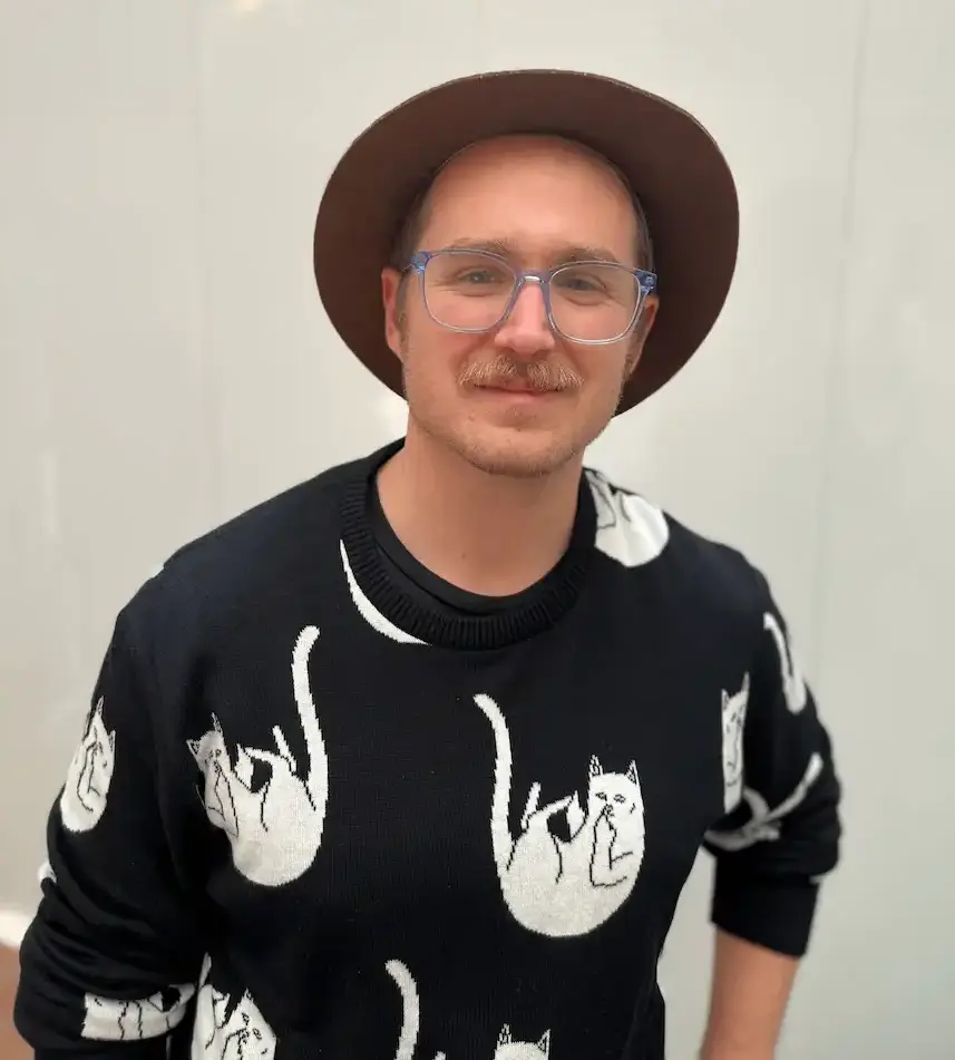 Joshua A. Fisher, a white man with a mustache and blue eyes.